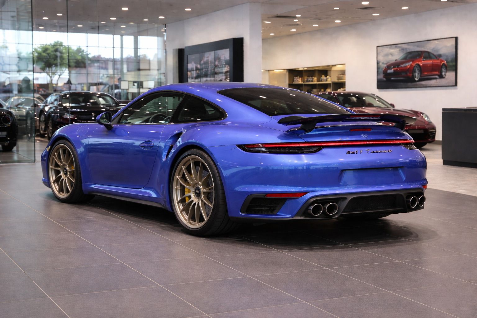 Three-quarter rear view of the Turbo S in showroom lighting
