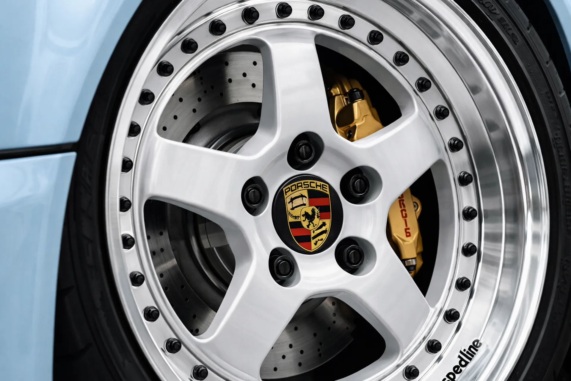 Porsche wheel fitment detail on Porsche Speedline wheel