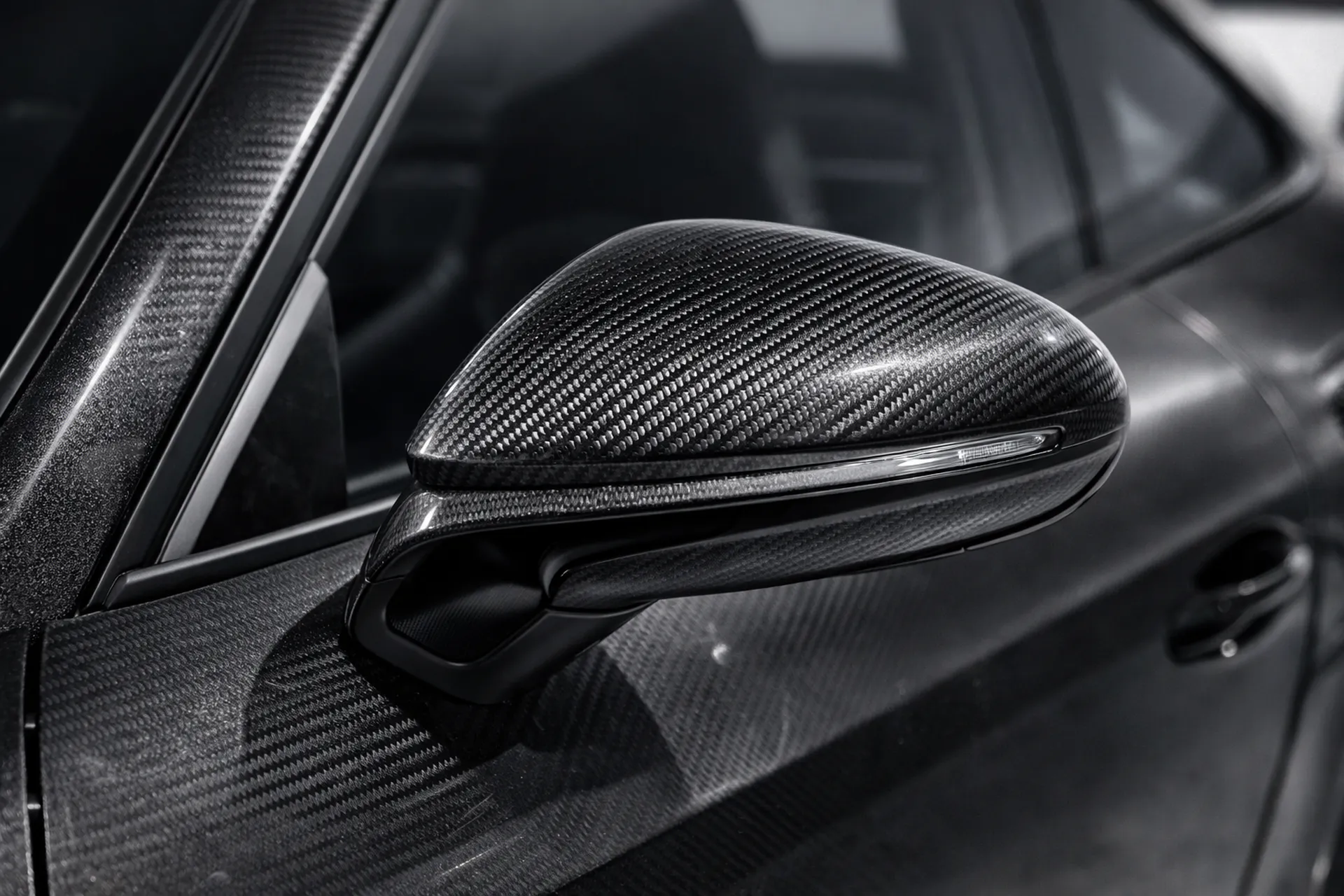 Streamlined carbon exterior mirror detail for Porsche 911 by Micarja Racing