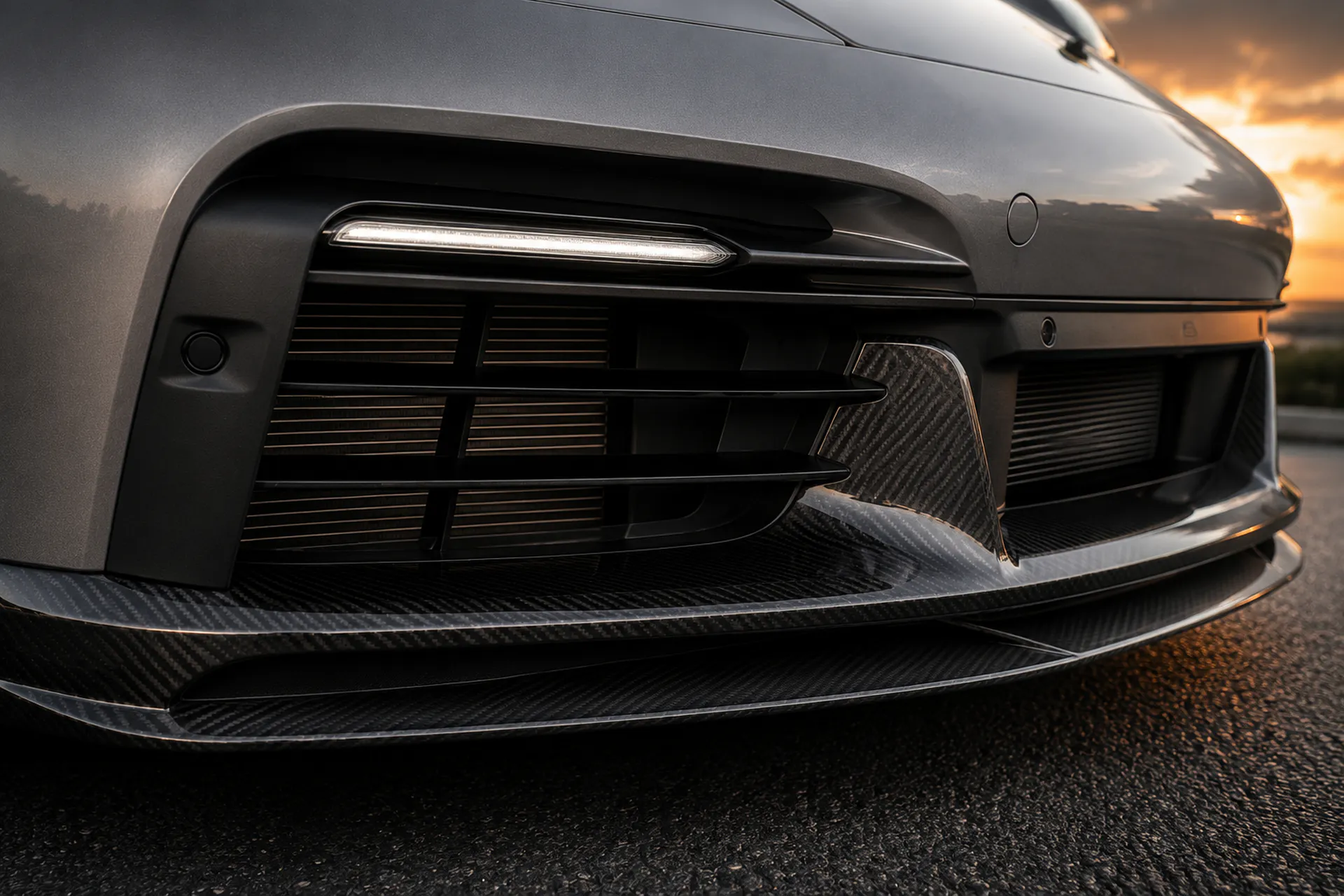 Porsche 992.2 Turbo S satin carbon front splitter by Micarja Racing