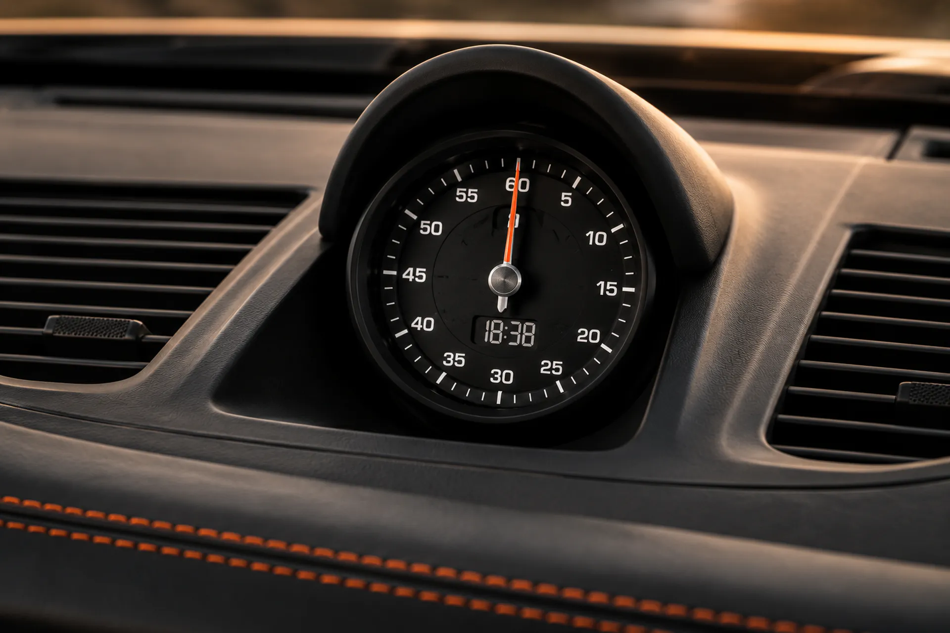 Bespoke Porsche Sport Chrono clock with orange hand and leather dashboard